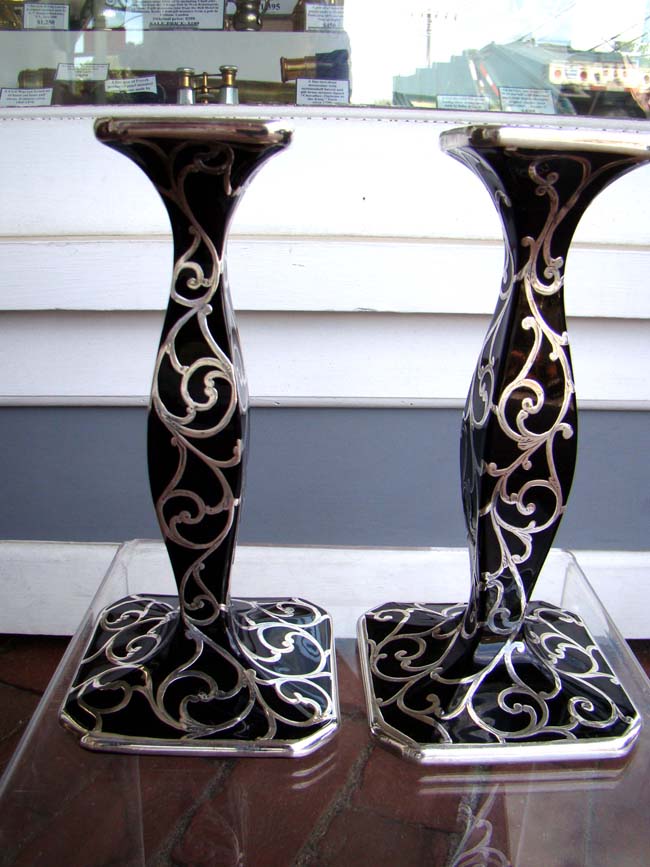 A fine and rare pair of Silver overlay black glass ART DECO candlesticks circa 1910